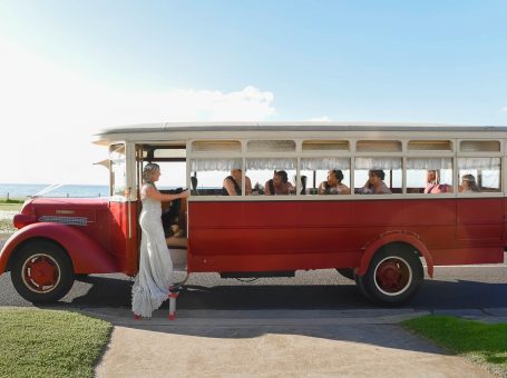 Wedding bus with bride and bridesmaids